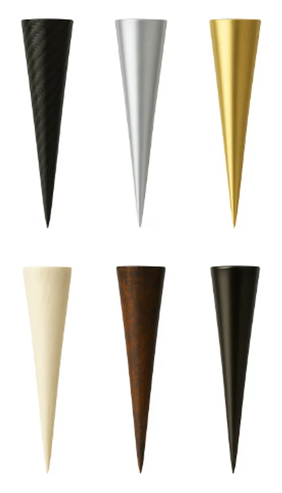 Coming soon concept render of six golf tees: carbon fiber, titanium, gold, bone, dark wood, and black